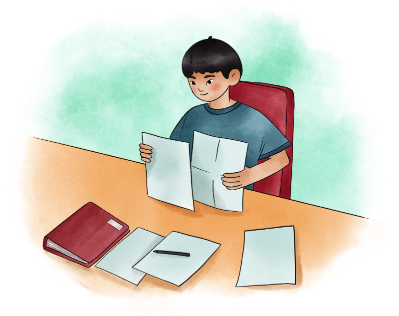 Boy reading at desk